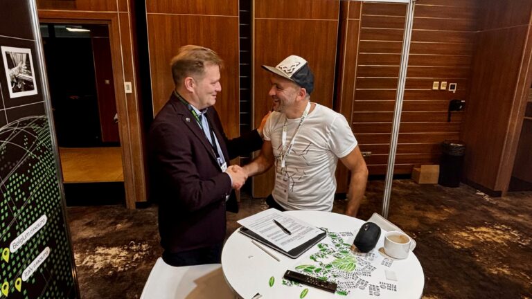 Two men shaking hands.