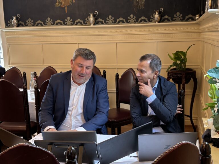 Two people in discussion.